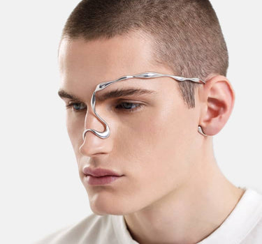 organic-shaped face jewelry in silver