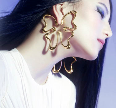 Large butterfly earring in gold