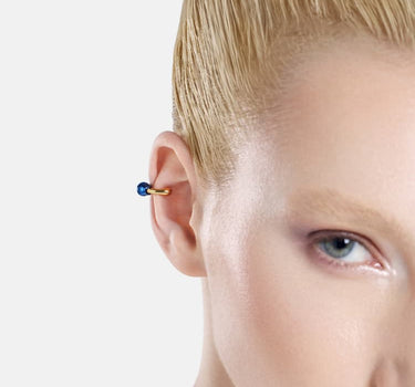 Casa Batlló huggie earcuff in gold and blue