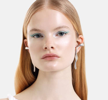 silver liquid earrings that hook around the ears