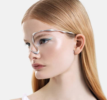 organic-shaped face jewelry in silver