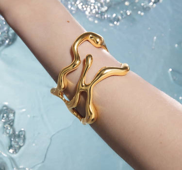 bold asymmetrical gold bangle