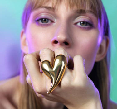 big heart shaped ring in gold